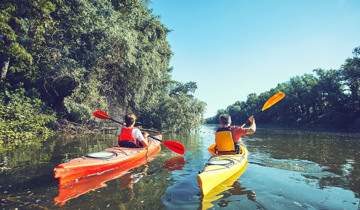 2 people kayaking down the st lucie river on the treasure coast near wylder