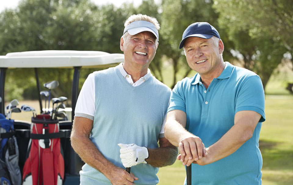 men smiling golfing