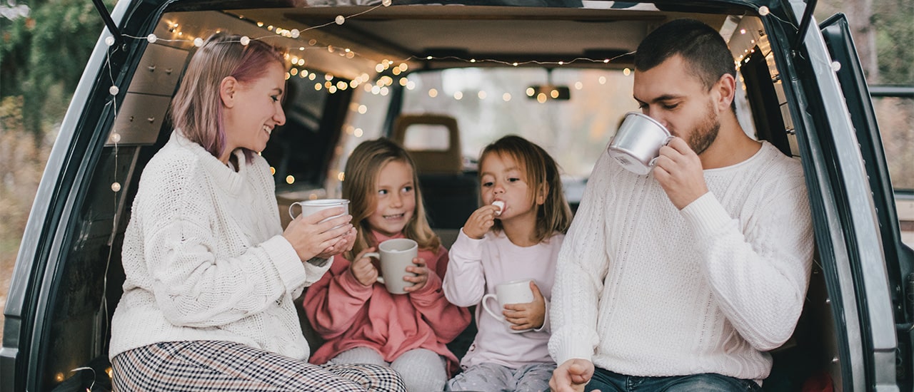 family holiday tailgating with hot coco