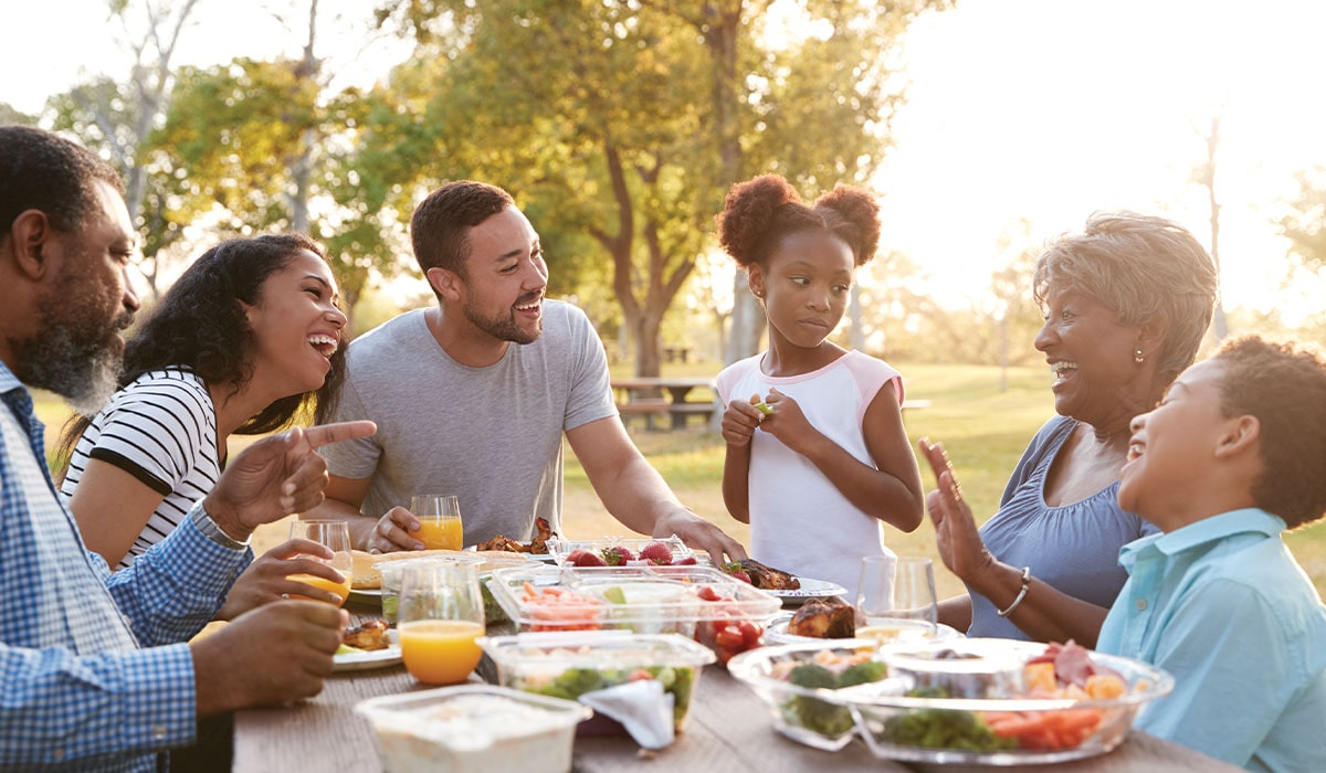 family having lunch outside