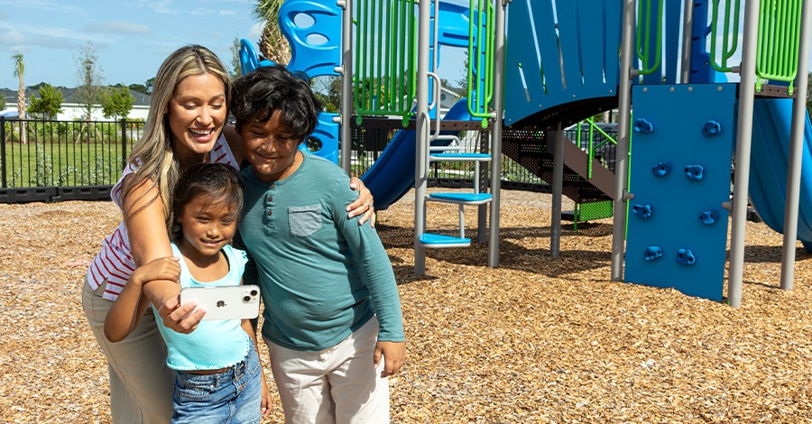 Family at the playground in Port St Lucie FL
