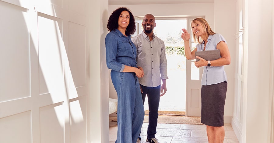 Realtor showing couple a new construction home