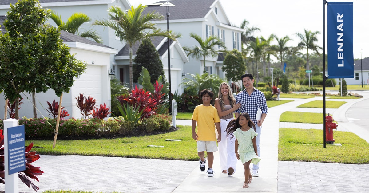 Family walking through the model homes at wylder
