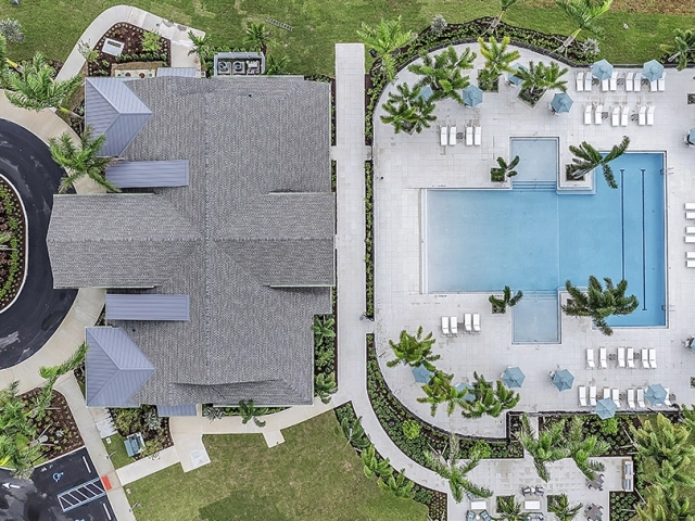 Overhead view of the resort-style pool and clubhouse at Wylder Port St. Lucie