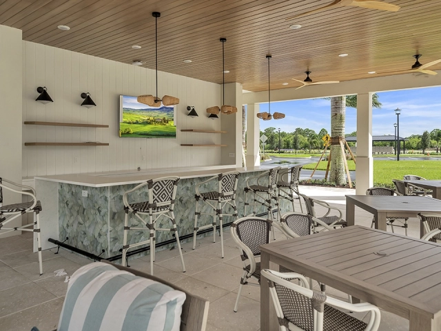Outdoor bar and dining patio at Wylder Port St. Lucie