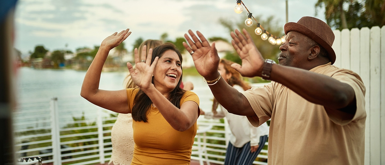 retired couple dancing at wylder