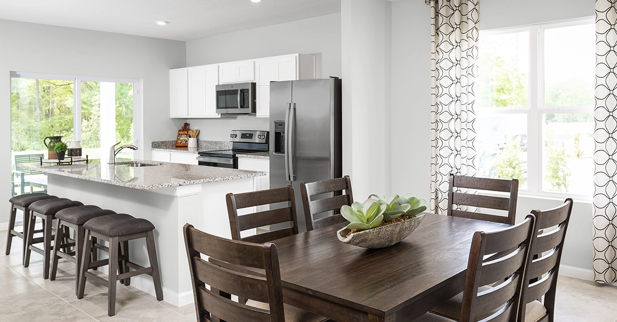 Modern kitchen and dining area inside a Waverly townhome
