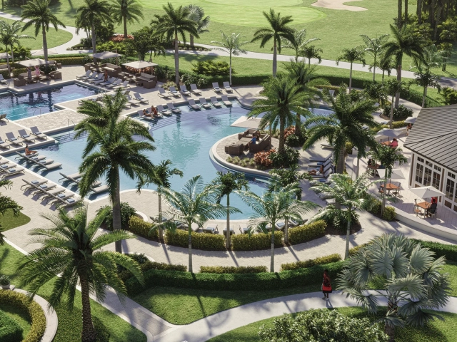 Aerial rendering of a curved resort pool with lounge seating, palm trees, and a golf course fairway visible in the background.