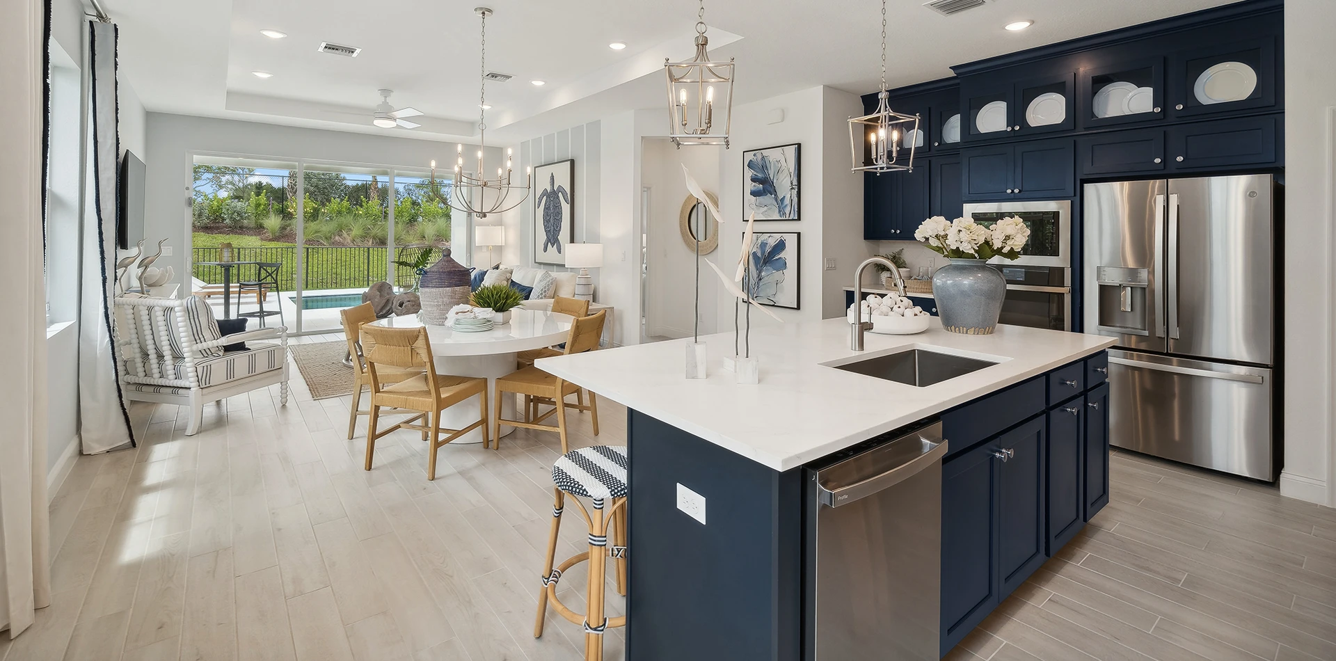 Modern kitchen with navy cabinetry and open dining area